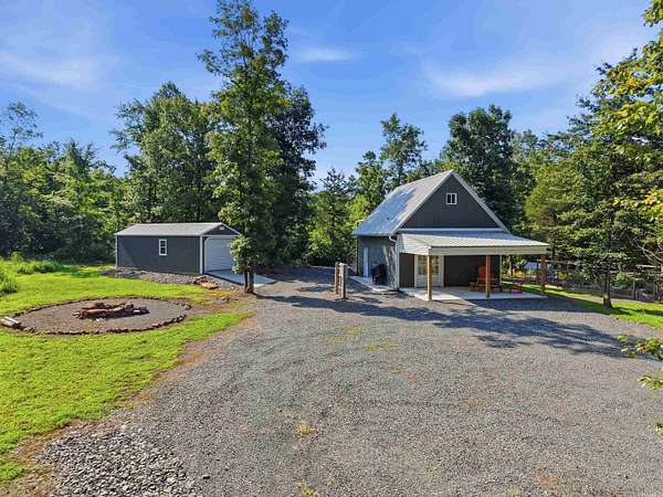 12.6 Acres of Land with Home for Sale in Edgemont, Arkansas