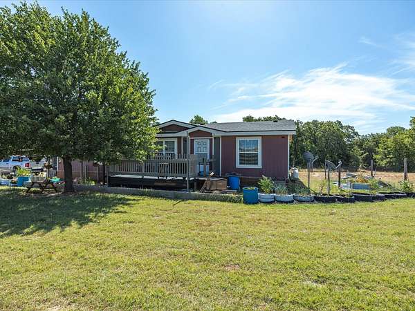 11.2 Acres of Land with Home for Sale in Springtown, Texas
