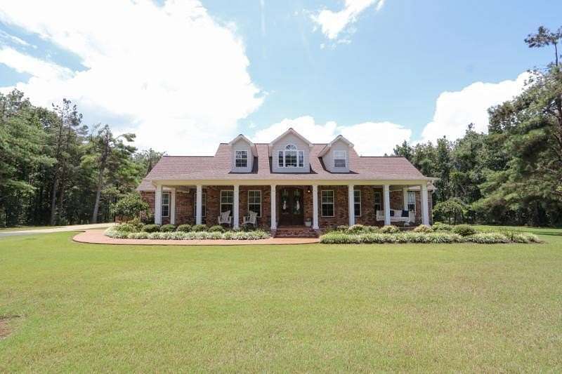 5 Acres of Land with Home for Sale in Blue Mountain, Mississippi