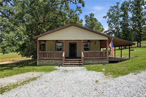5.73 Acres of Land with Home for Sale in Elkins, Arkansas