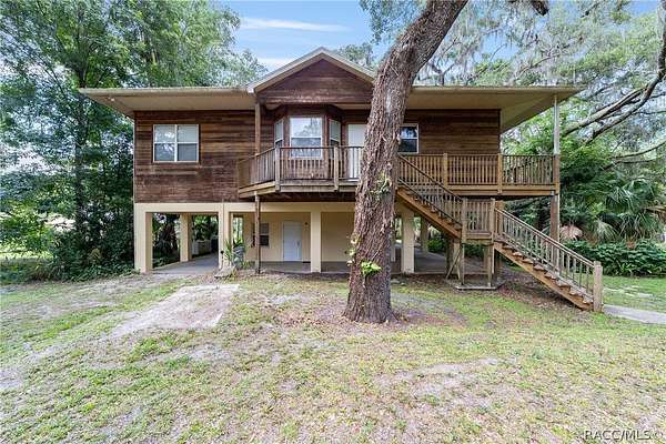 1.53 Acres of Land with Home for Sale in Inverness, Florida