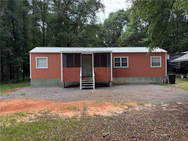 0.92 Acres of Land with Home for Sale in Eight Mile, Alabama