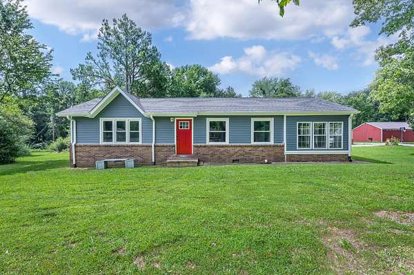 2 Acres of Land with Home for Sale in Tennessee Ridge, Tennessee