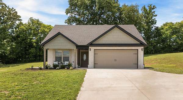 4.12 Acres of Land with Home for Sale in Woodlawn, Tennessee
