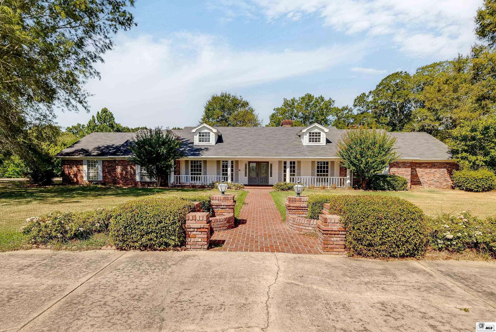 12.5 Acres of Land with Home for Sale in Bastrop, Louisiana