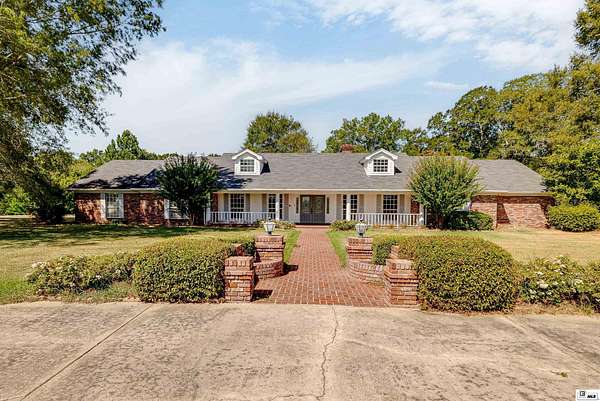 12.5 Acres of Land with Home for Sale in Bastrop, Louisiana