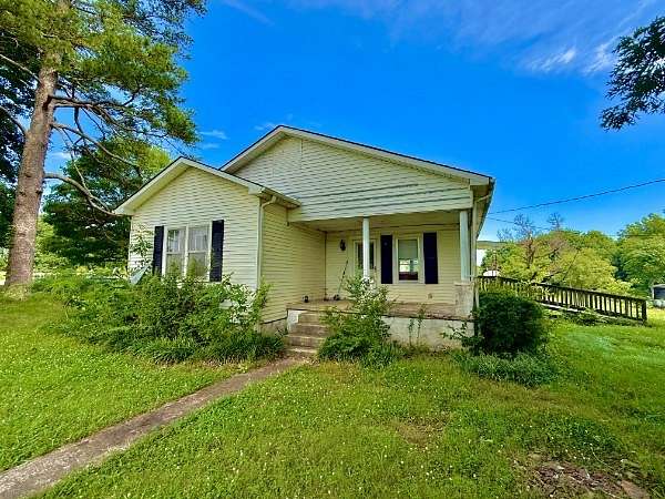 1.5 Acres of Land with Home for Sale in Loretto, Tennessee