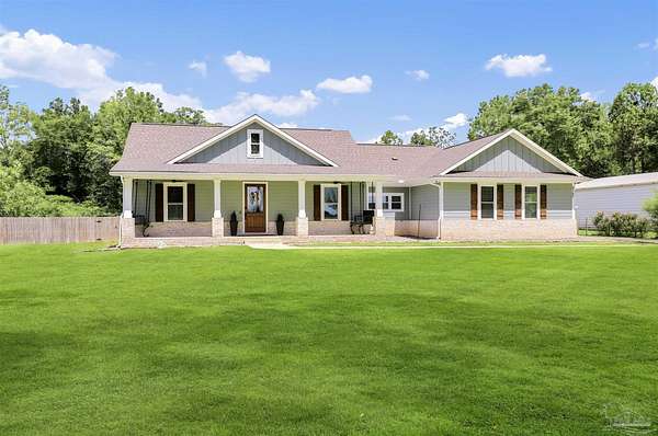 5 Acres of Land with Home for Sale in Holt, Florida