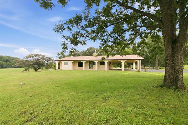 20.7 Acres of Agricultural Land with Home for Sale in Paris, Tennessee
