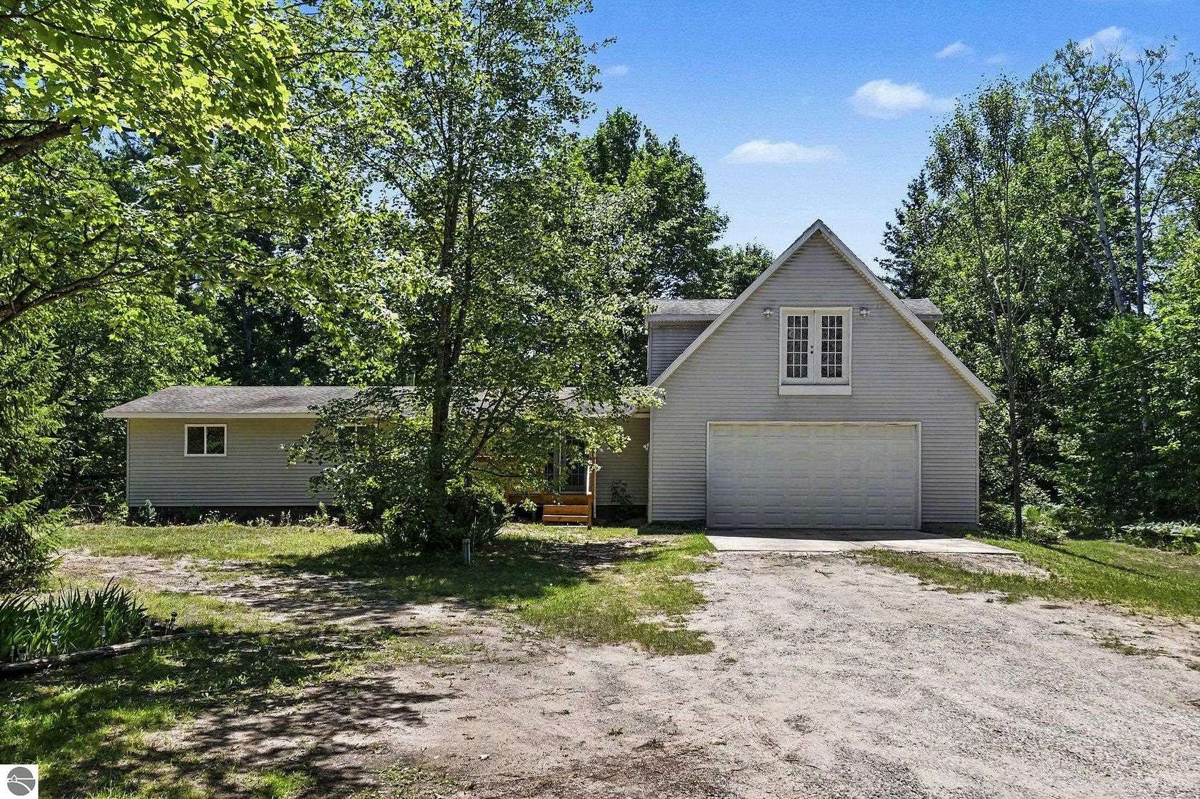9.42 Acres of Land with Home for Sale in South Boardman, Michigan