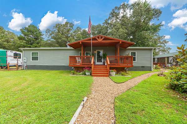 7 Acres of Land with Home for Sale in Camden, Tennessee