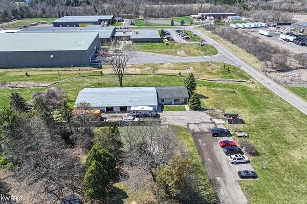 1.77 Acres of Improved Commercial Land for Sale in Holly, Michigan