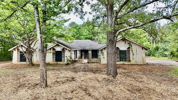 9.6 Acres of Land with Home for Sale in Raymond, Mississippi
