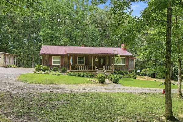 2.3 Acres of Land with Home for Sale in Holladay, Tennessee