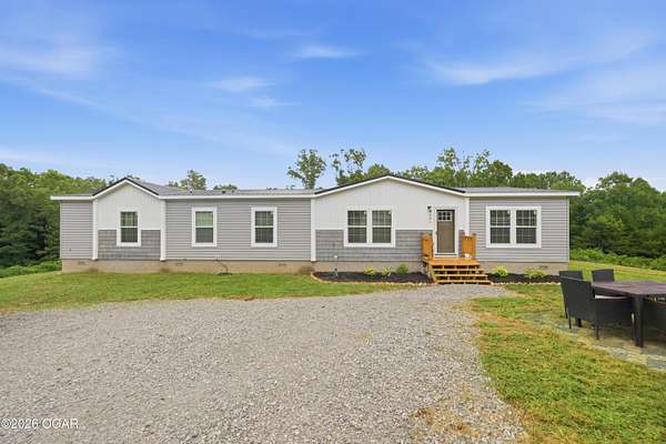 26 Acres of Land with Home for Sale in Anderson, Missouri