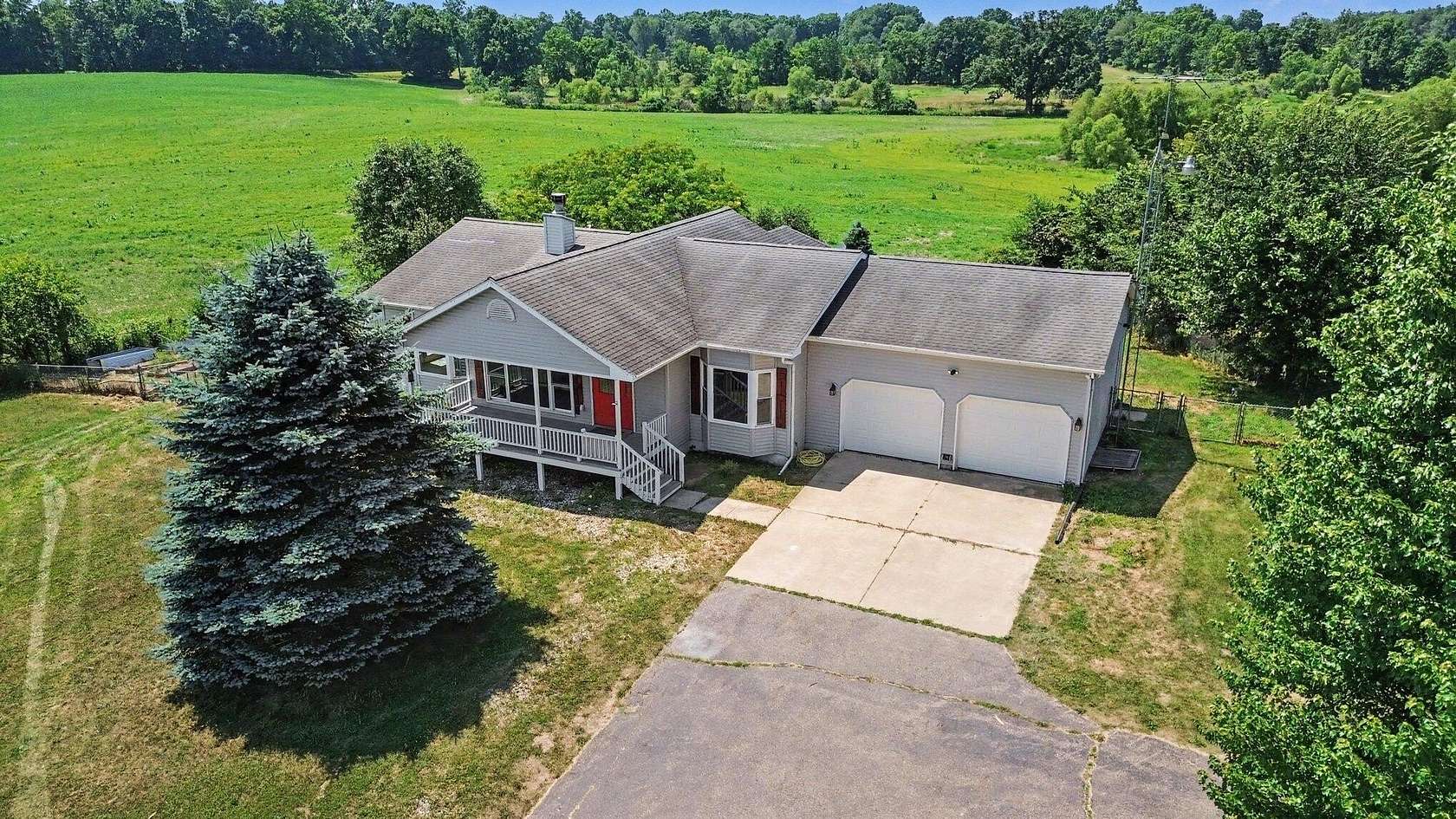 2 Acres of Land with Home for Sale in Bellevue, Michigan
