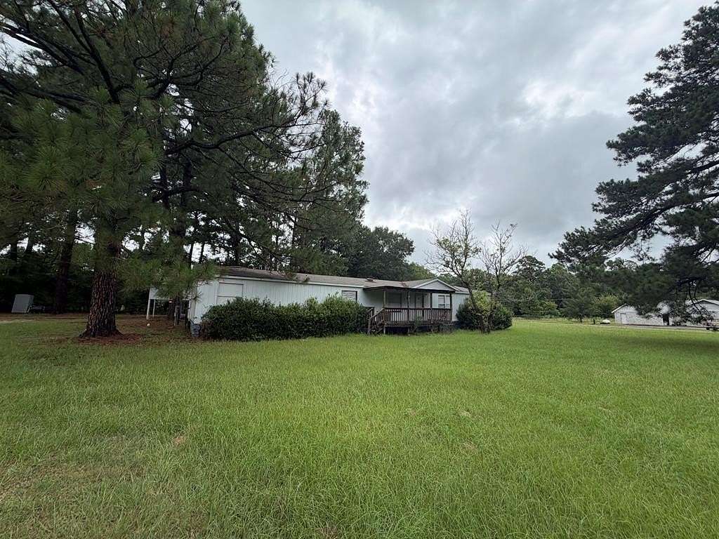 5 Acres of Land with Home for Sale in Elkhart, Texas