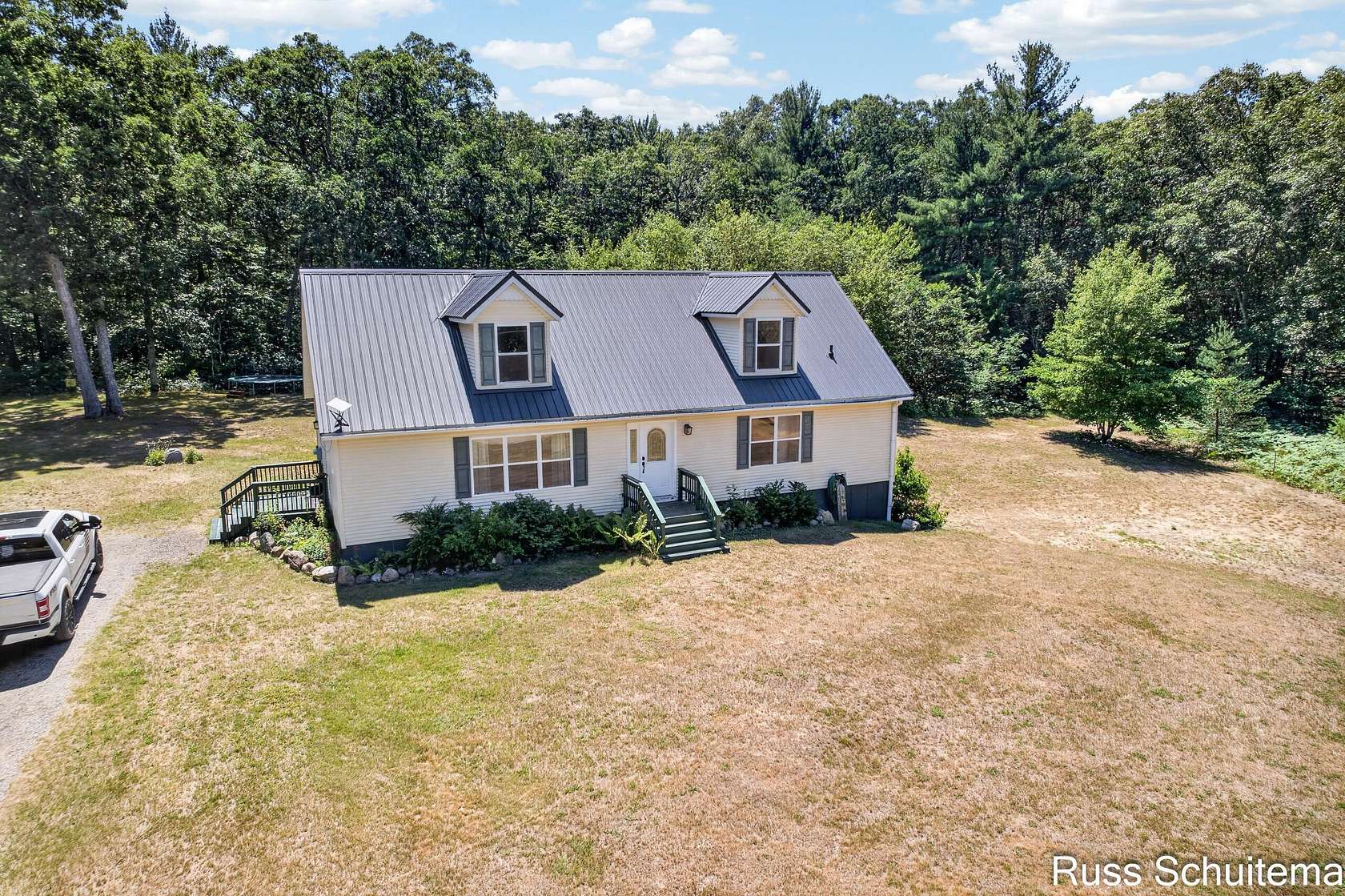 3.75 Acres of Land with Home for Sale in Holton, Michigan