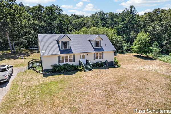 3.75 Acres of Land with Home for Sale in Holton, Michigan