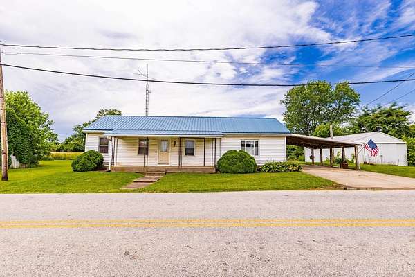 7.3 Acres of Land with Home for Sale in West Union, Ohio