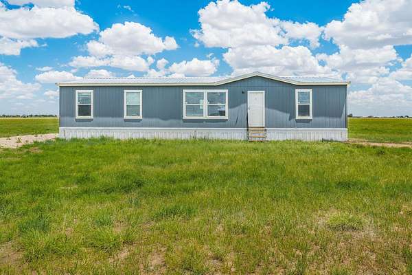 5 Acres of Land with Home for Sale in Amarillo, Texas
