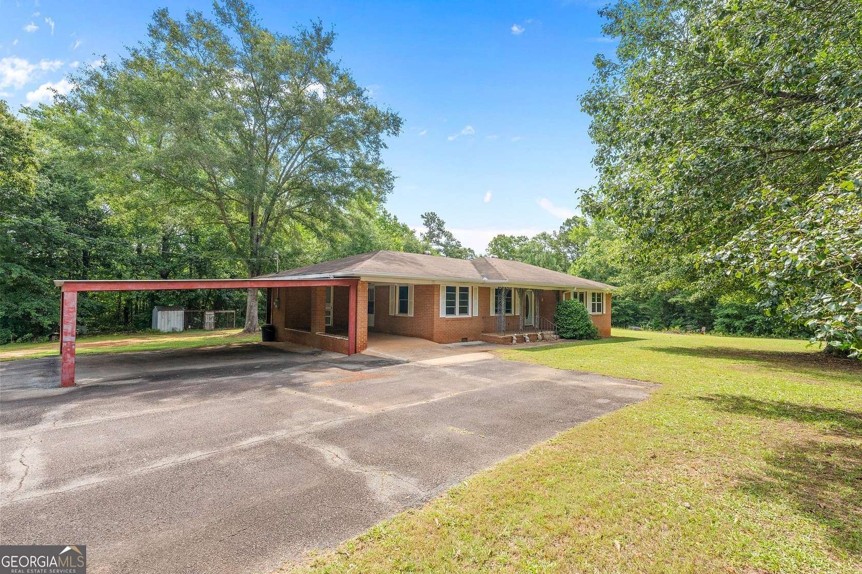 25.9 Acres of Land with Home for Sale in Carrollton, Georgia