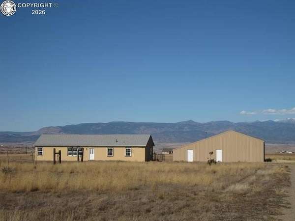 33.7 Acres of Recreational Land with Home for Sale in Florence, Colorado