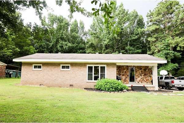 1.76 Acres of Land with Home for Sale in Spruce Pine, Alabama