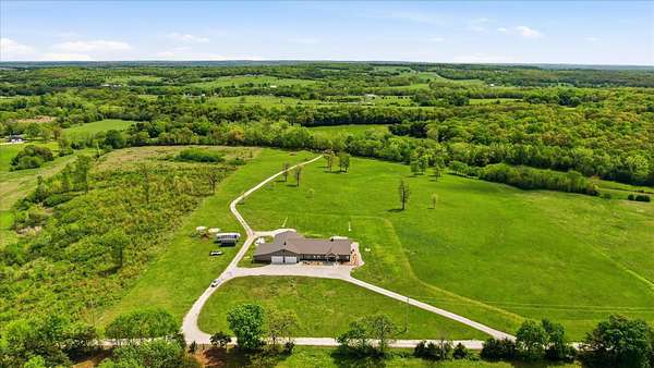 20 Acres of Land with Home for Sale in Dunnegan, Missouri