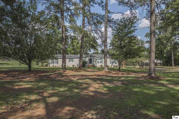 1.73 Acres of Land with Home for Sale in Eros, Louisiana