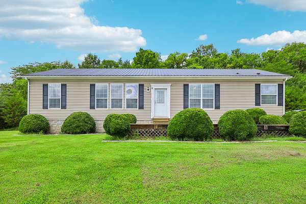 26.8 Acres of Land with Home for Sale in Auburntown, Tennessee