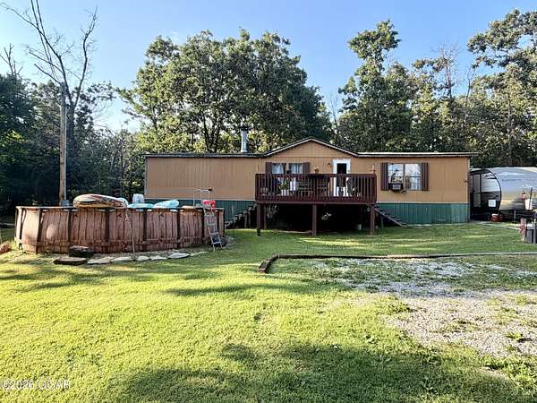 3.8 Acres of Land with Home for Sale in Granby, Missouri