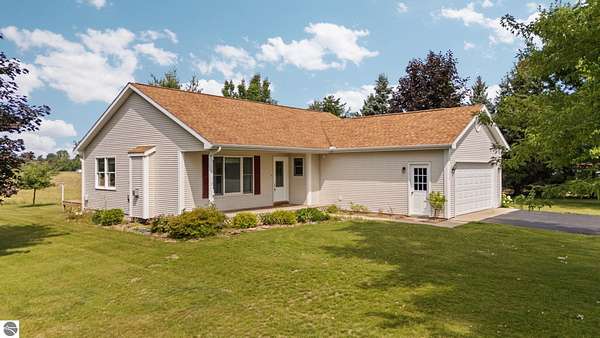 10 Acres of Land with Home for Sale in Kingsley, Michigan