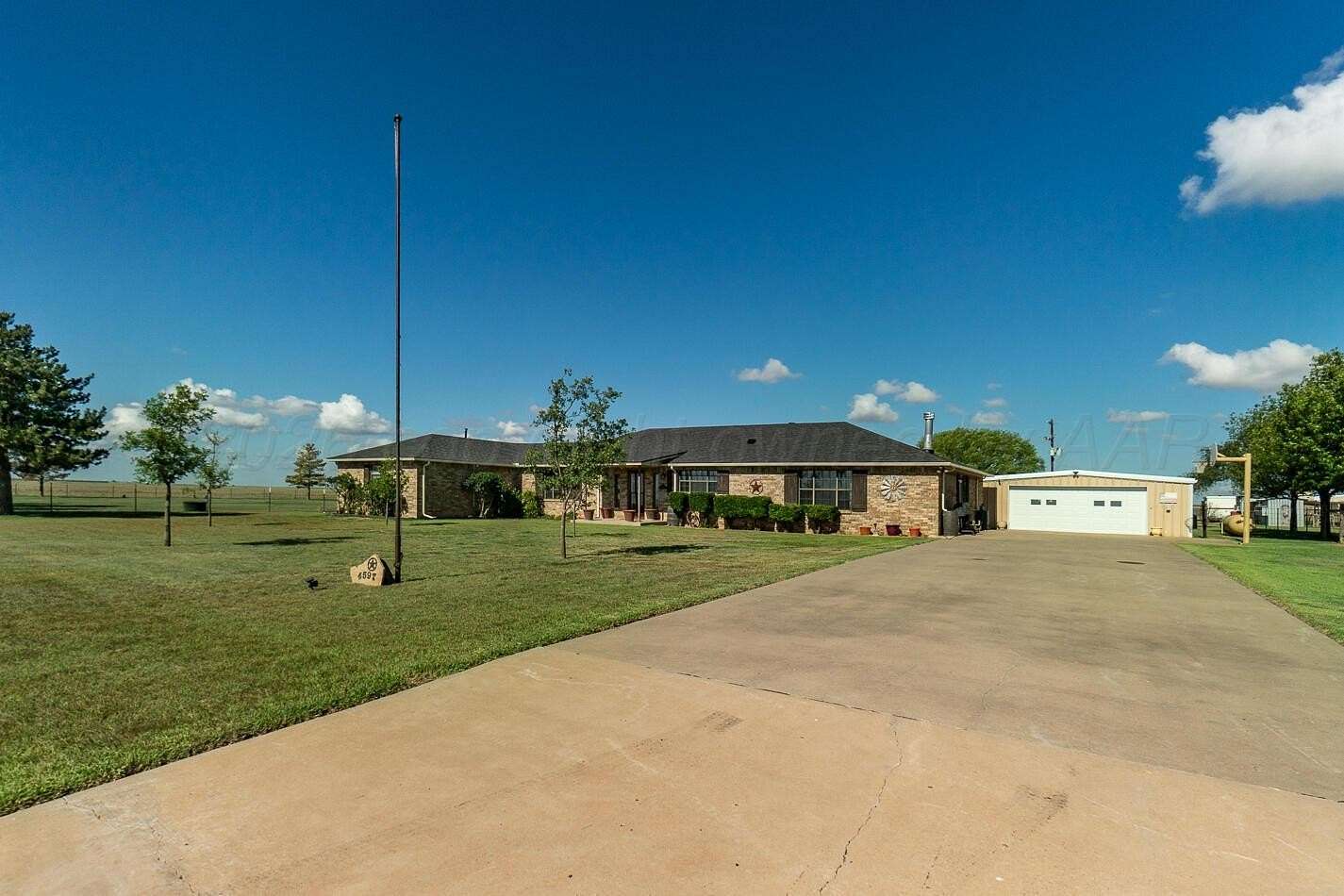 4.89 Acres of Land with Home for Sale in Claude, Texas