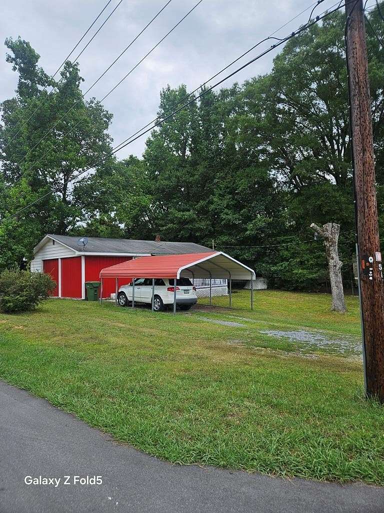 0.24 Acres of Land with Home for Sale in Chatsworth, Georgia