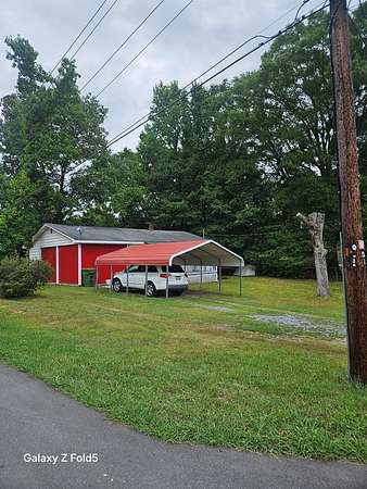 0.24 Acres of Land with Home for Sale in Chatsworth, Georgia