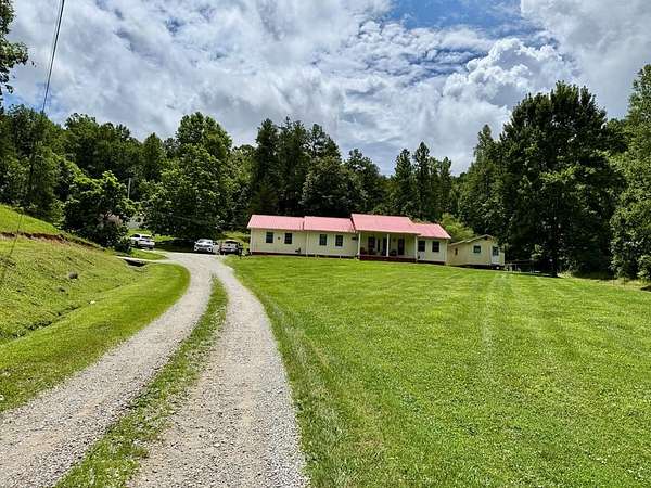 14.6 Acres of Recreational Land with Home for Sale in Louisa, Kentucky