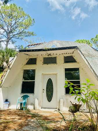 2.3 Acres of Land with Home for Sale in Cocoa, Florida