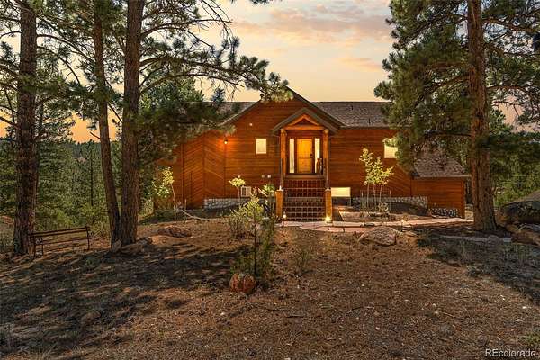 5 Acres of Land with Home for Sale in Bailey, Colorado
