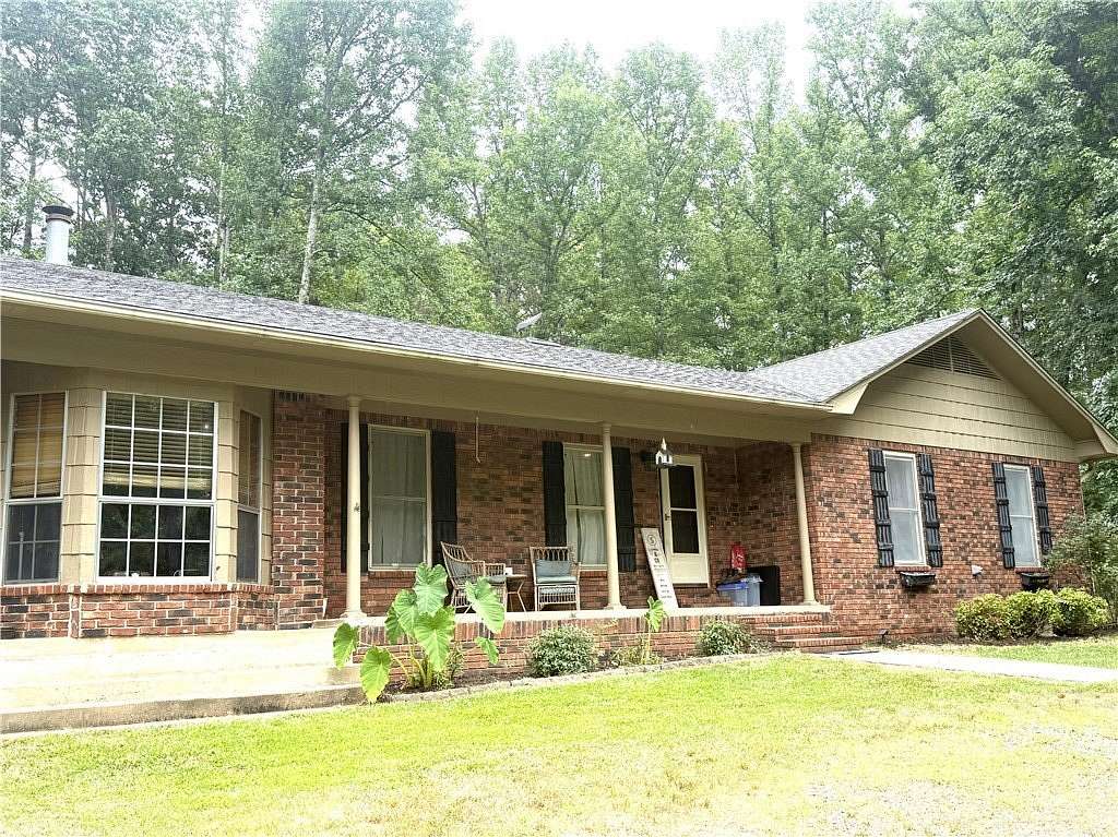 4.73 Acres of Land with Home for Sale in Russellville, Arkansas