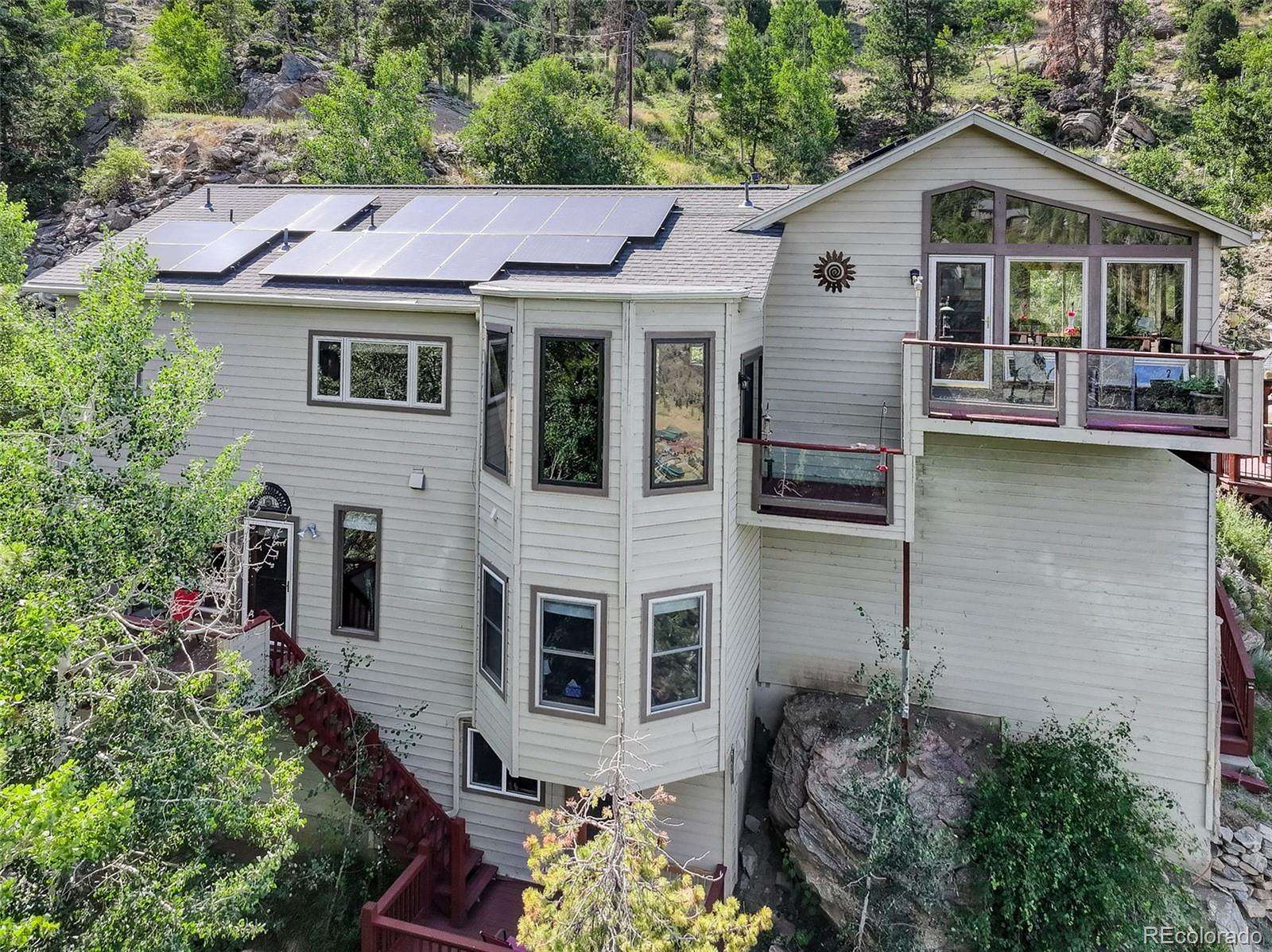 1.6 Acres of Land with Home for Sale in Evergreen, Colorado