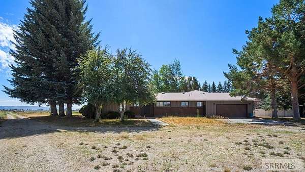 20.4 Acres of Agricultural Land with Home for Sale in Rigby, Idaho