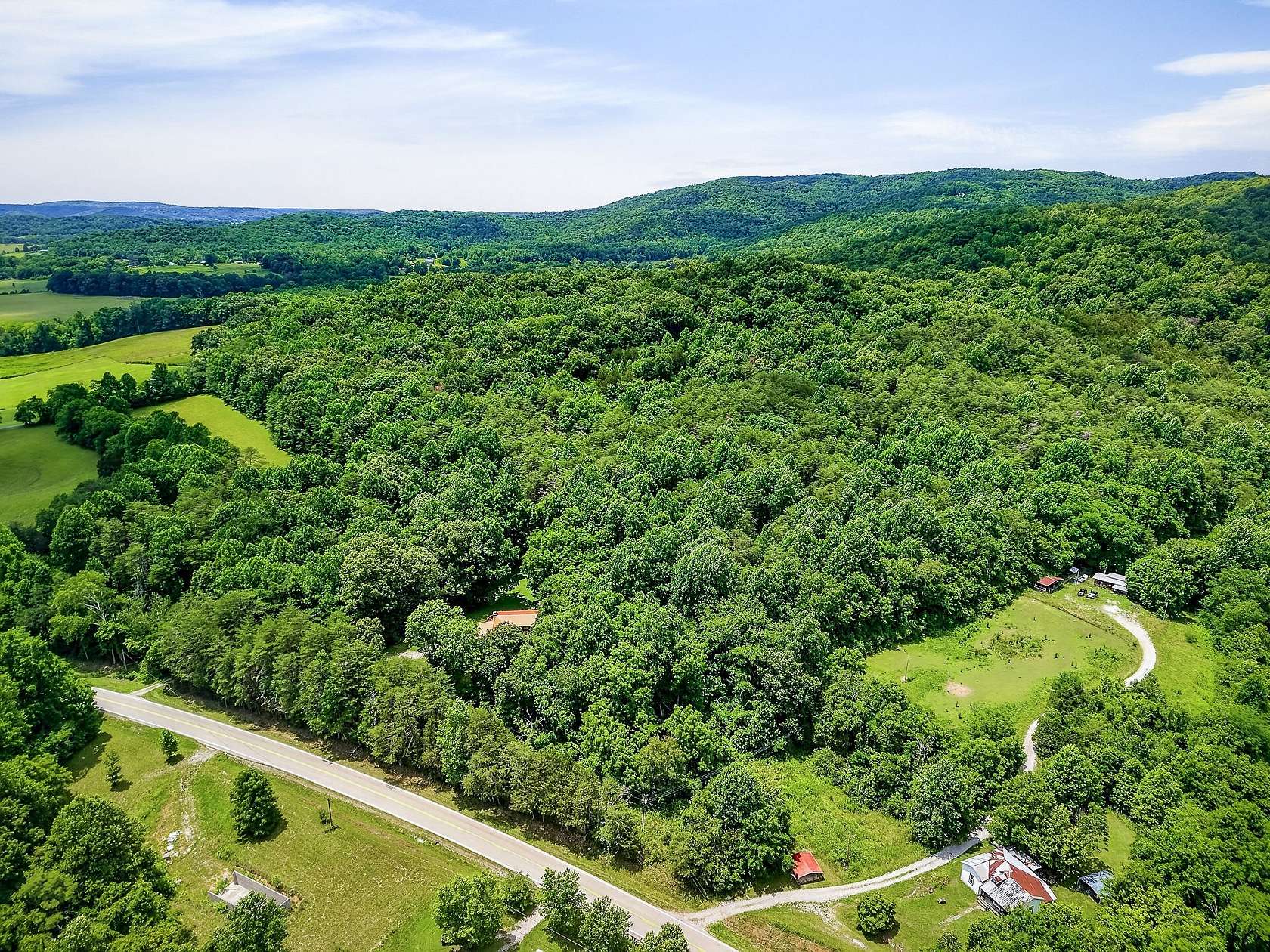 8.9 Acres of Land with Home for Sale in Sparta, Tennessee
