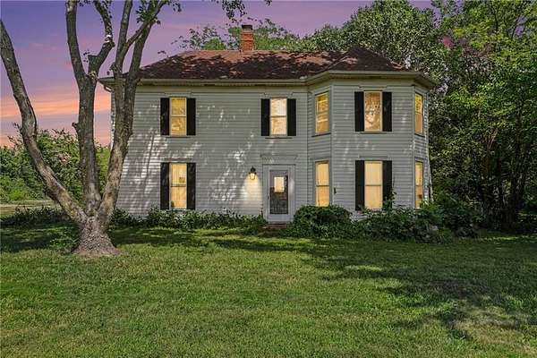 10 Acres of Land with Home for Sale in Buckner, Missouri