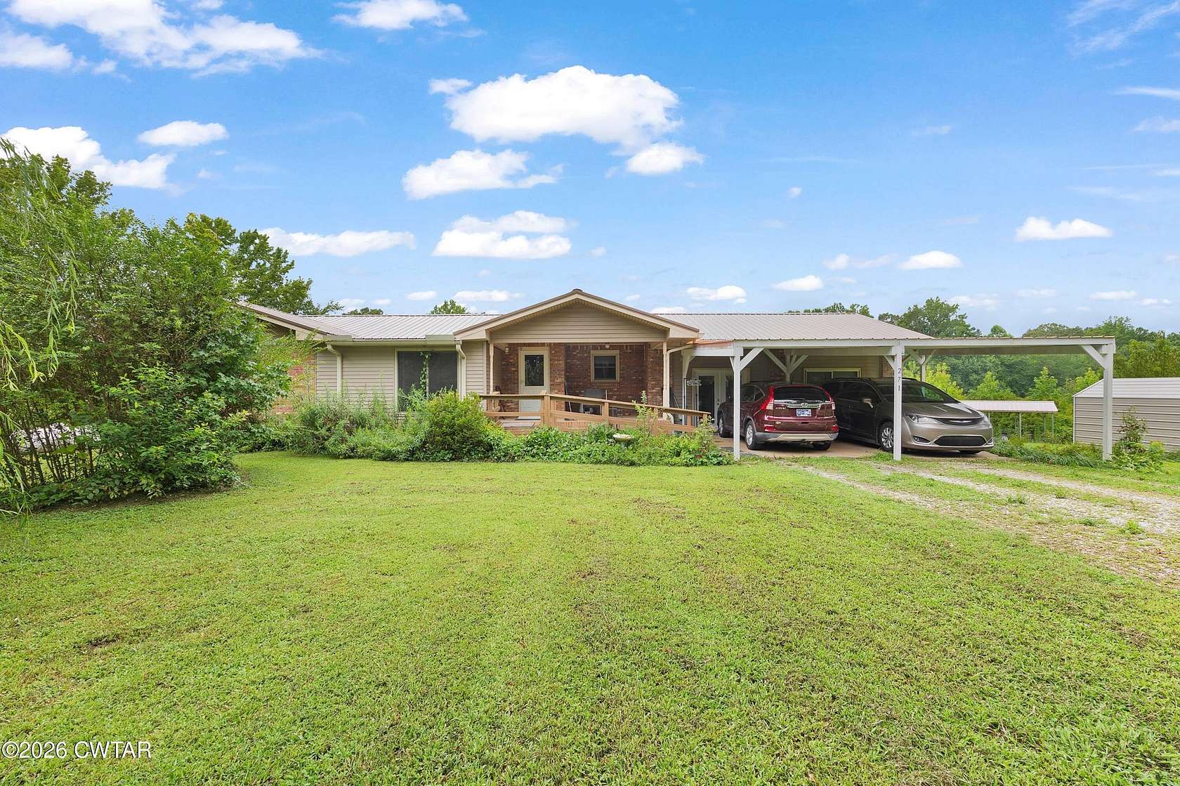 14 Acres of Land with Home for Sale in Scotts Hill, Tennessee