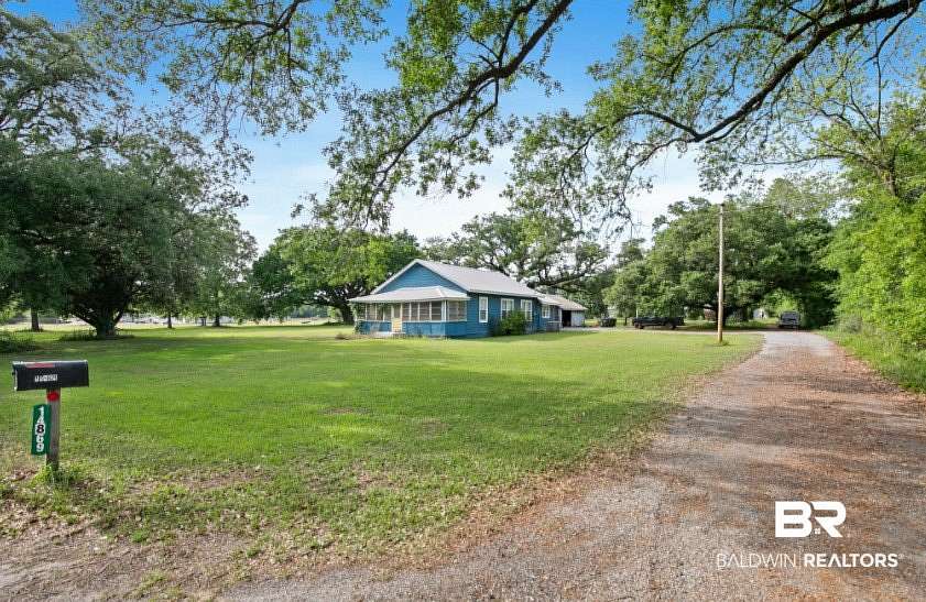 2.63 Acres of Land with Home for Sale in Summerdale, Alabama