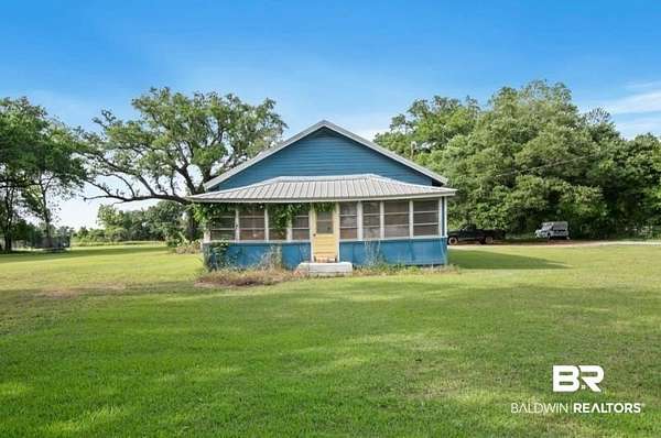 2.63 Acres of Land with Home for Sale in Summerdale, Alabama