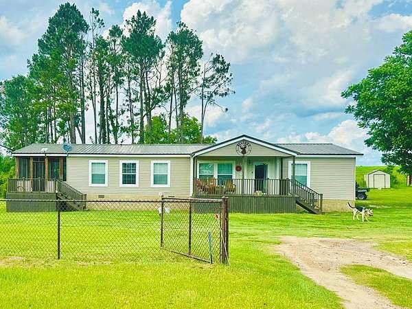 7.16 Acres of Land with Home for Sale in Broxton, Georgia