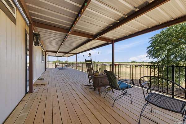 10.7 Acres of Land with Home for Sale in Devine, Texas