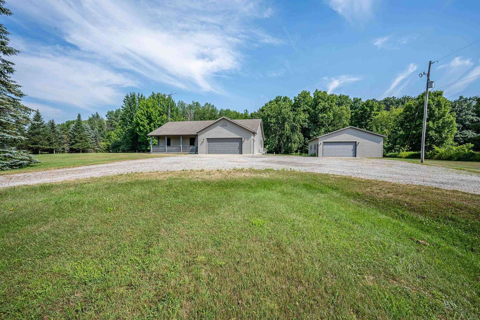 50 Acres of Recreational Land with Home for Sale in Coleman, Michigan